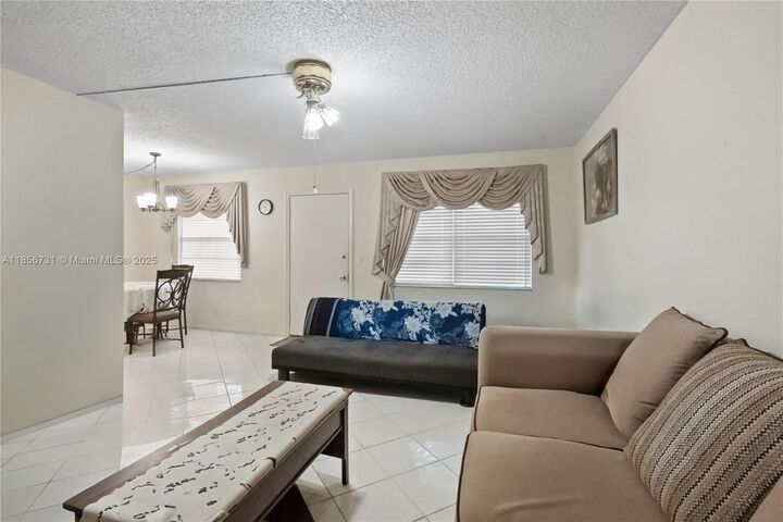 Property Photo:  1401 SW 135th Ter 310H  FL 33027 