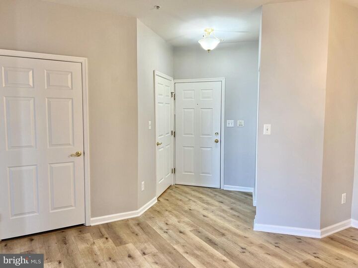 Property Photo:  2000 Whispering Ponds Court 1B  MD 21804 