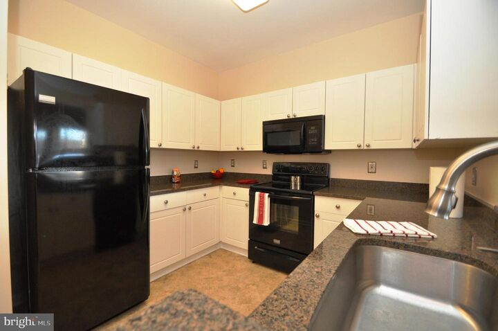 Property Photo:  4550 Strutfield Lane 2323  VA 22311 