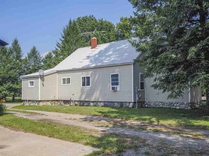 Property Photo:  635 N Advance  MI 49712 