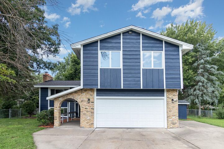 Property Photo:  2912 80th Circle N  MN 55444 