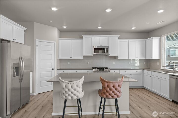 Property Photo:  902  Bunting Place SE 84  WA 98366
