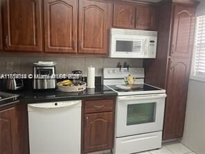 Property Photo:  1801 NW 75th Ave 302  FL 33313 