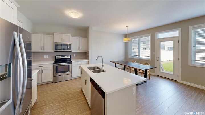 Property Photo:  4606 Green Brooks Way E  SK S4V 3K6 