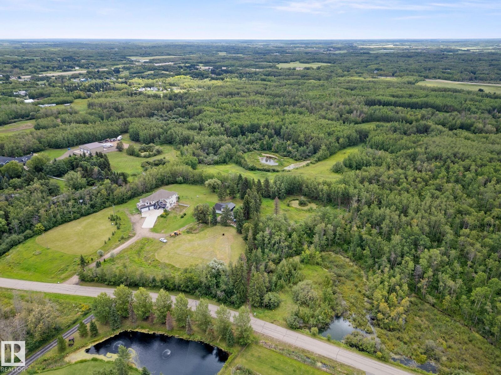 Property Photo:  52257 Rge Road 231 61  AB T8B 1A7 