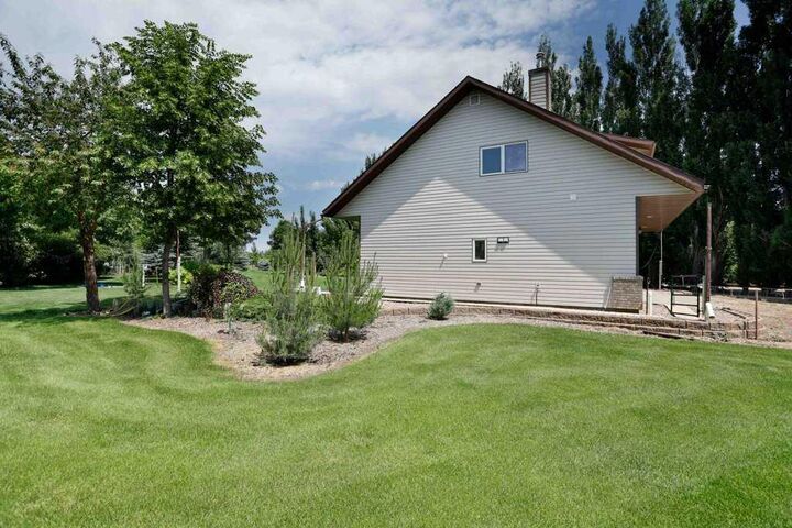 Property Photo:  145006 Cassils Road 142  AB T1R 1B4 