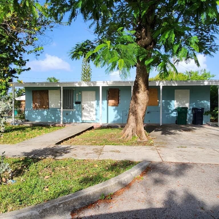 Property Photo: 1461 NW 2nd Ct FL 33034