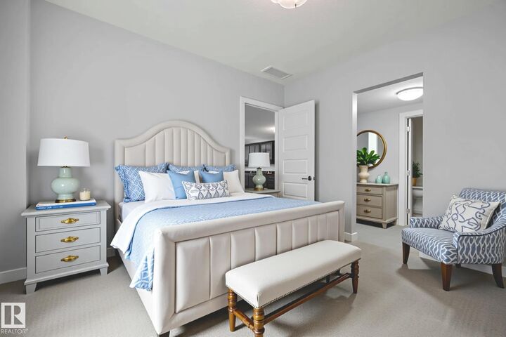 Property Photo: 5151 Windermere Boulevard SW 810 AB T6W 2K4