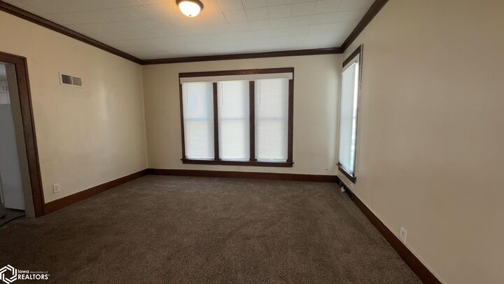 Property Photo: 702 E Main Street IA 50158