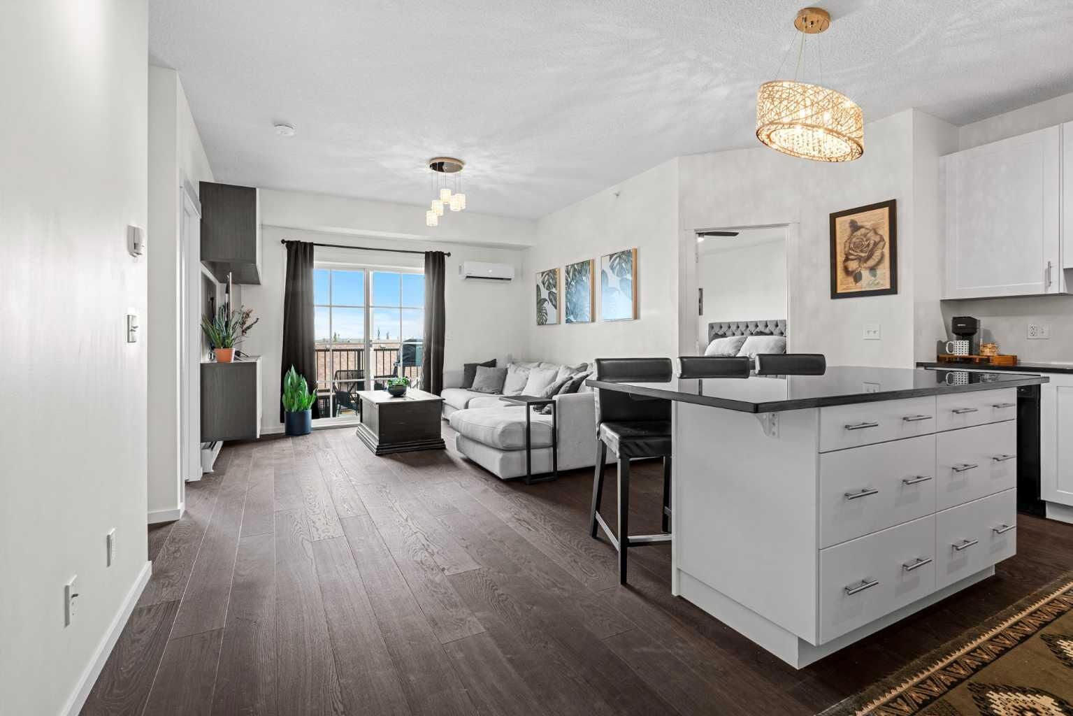 Property Photo: 755 Copperpond Boulevard SE 4406 AB T2Z 4R2