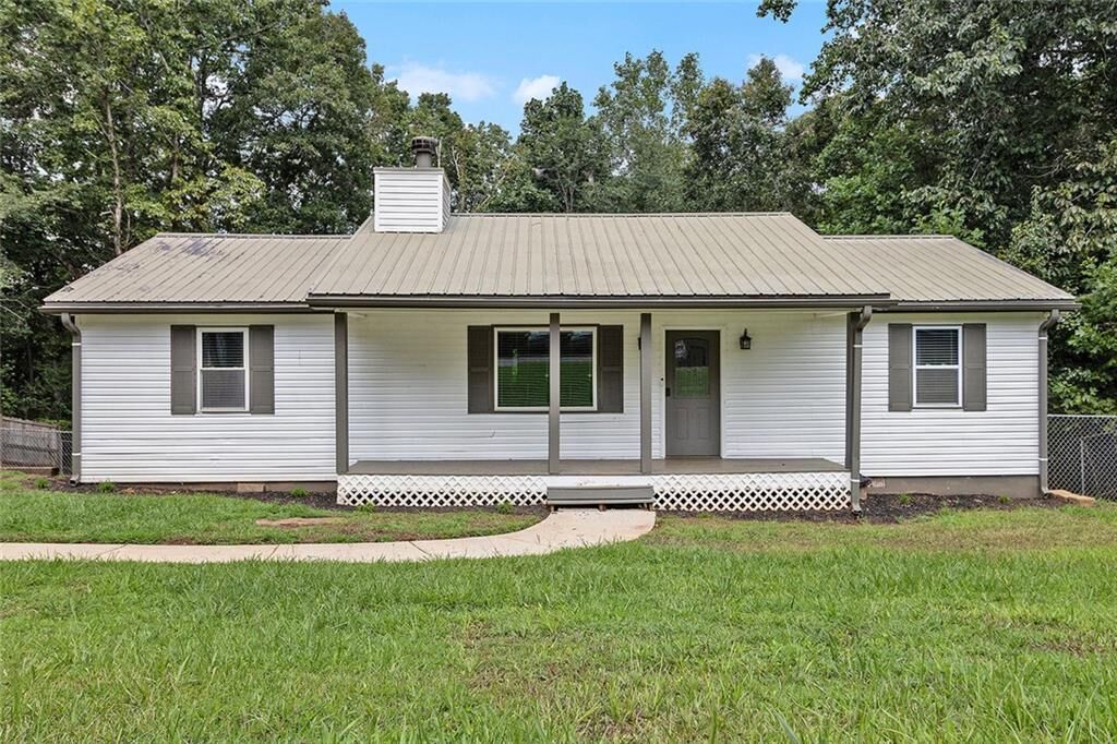 Property Photo:  301 Collins Road  GA 30534 