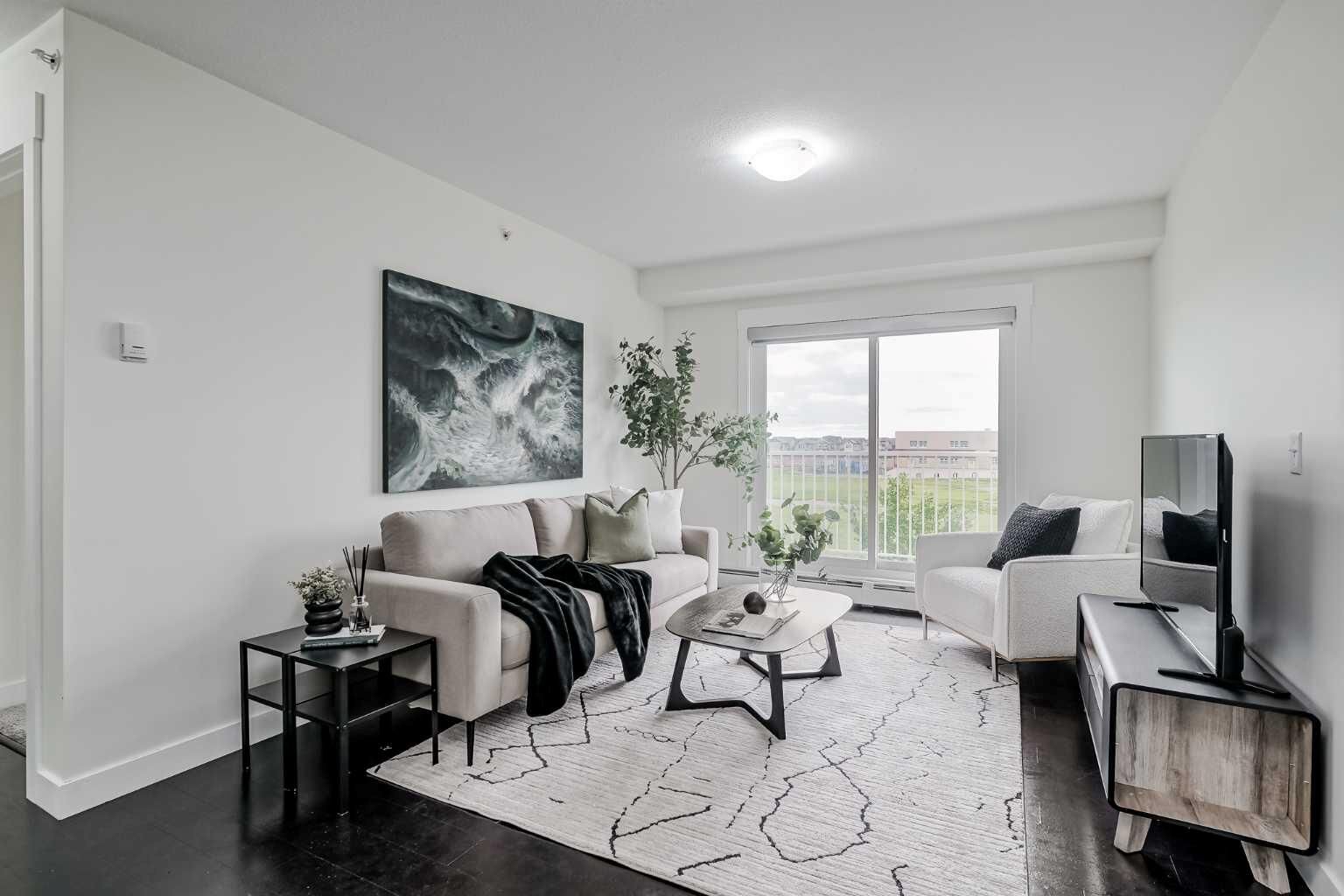 Property Photo:  302 Skyview Ranch Drive NE 7404  AB T3N 0P5 