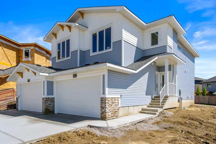 Photo de la propriété: 66 Heritage Circle AB T4C 3G9