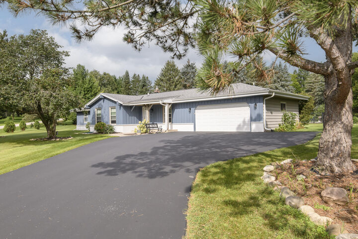 Property Photo: W315n631 Huckleberry Way WI 53018