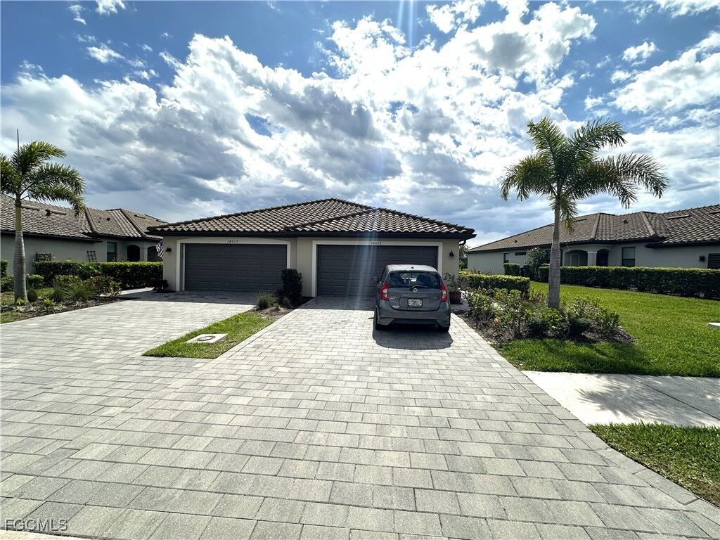 Property Photo:  14013 Winding Cedar Way  FL 33913 