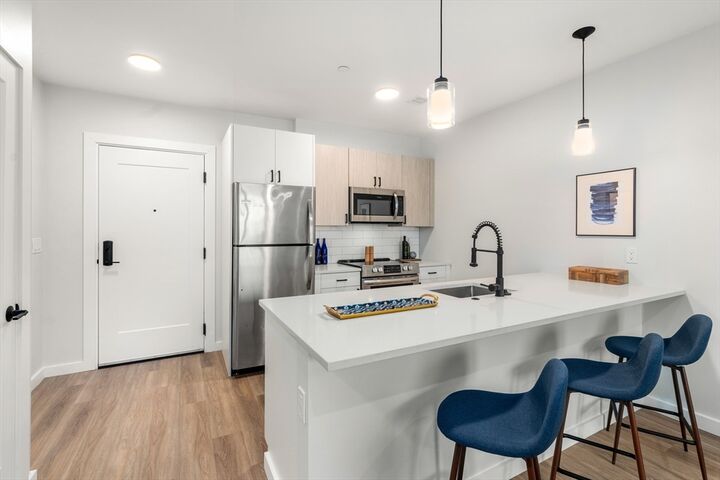Property Photo:  10 Somerset 405  MA 02152 