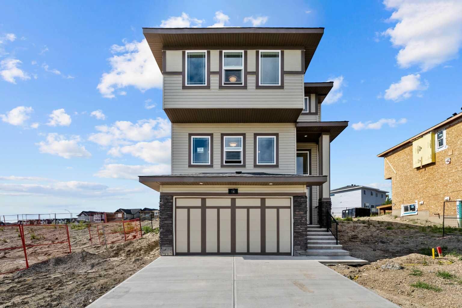 Photo de la propriété:  129 Heritage Boulevard  AB T4C 3G8 