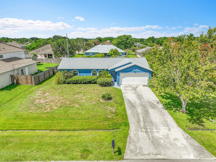Property Photo: 1642 SW McAllister Lane FL 34953