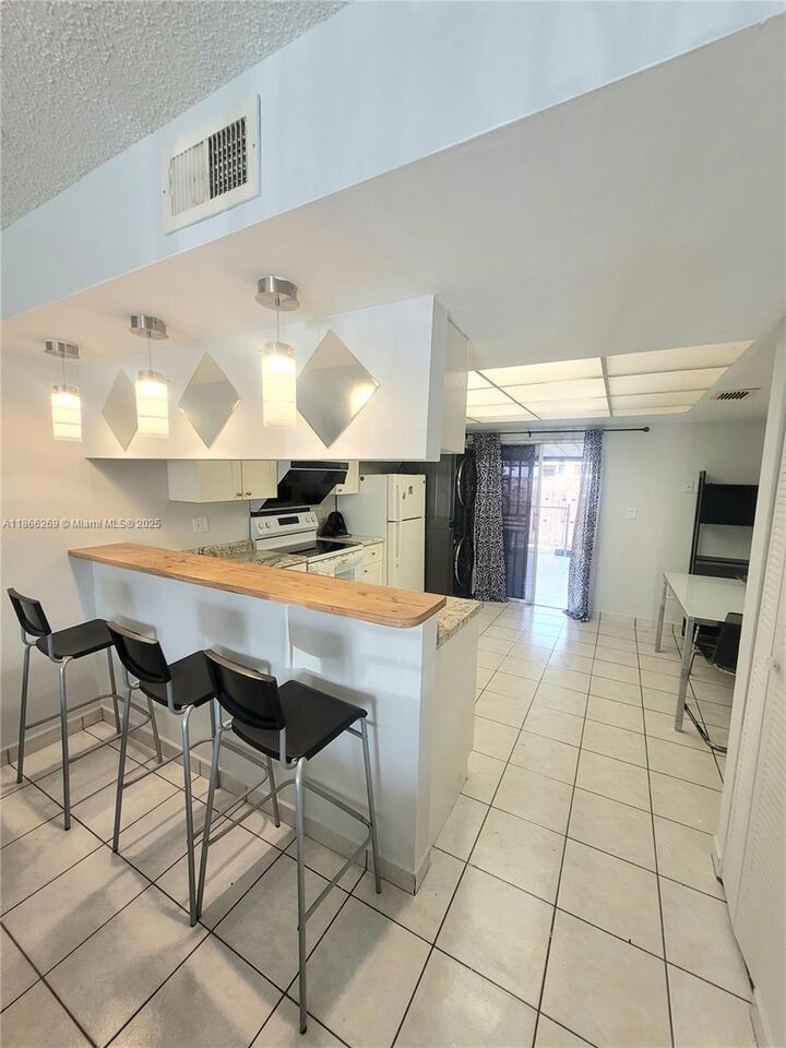 Property Photo: 3973 W 9th Ln 3 FL 33012