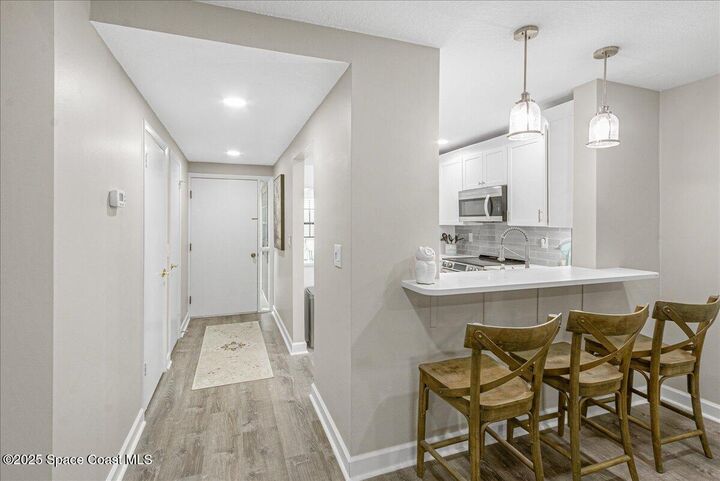 Property Photo:  255 Paradise Boulevard  FL 32903 