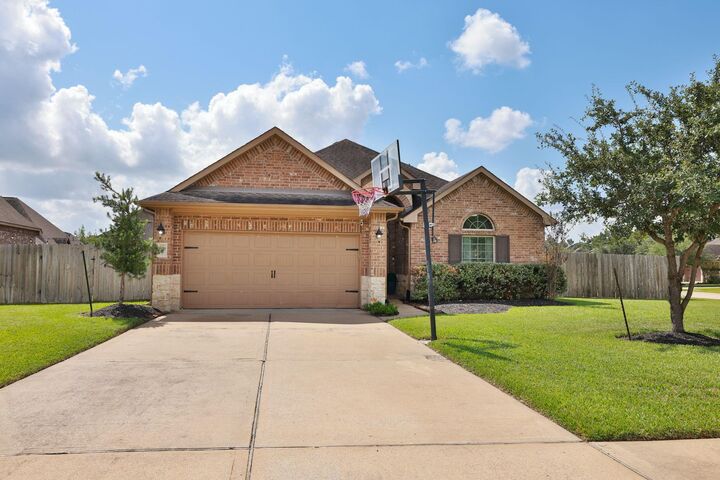 Property Photo: 11019 Arthurian Dream Court TX 77375