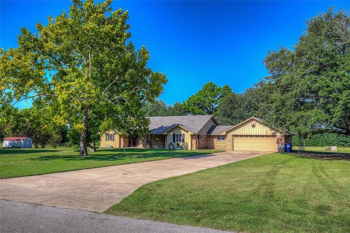 Property Photo:  209 County Road 4215  TX 75494 