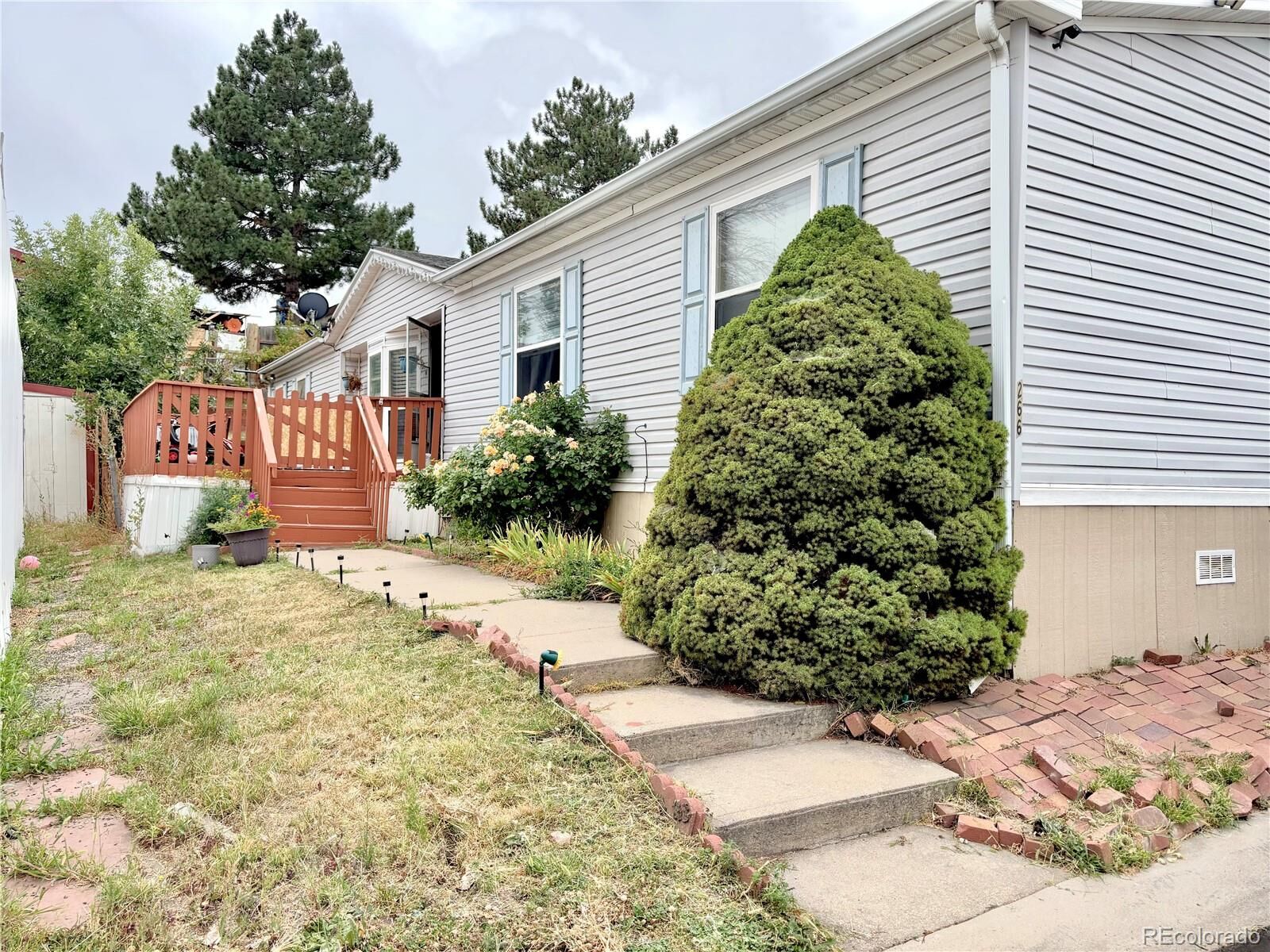 Property Photo:  2660 Hawk Street  CO 80260 