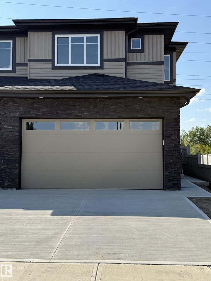 Property Photo: 68 Waverly Wy AB T8L 3L7