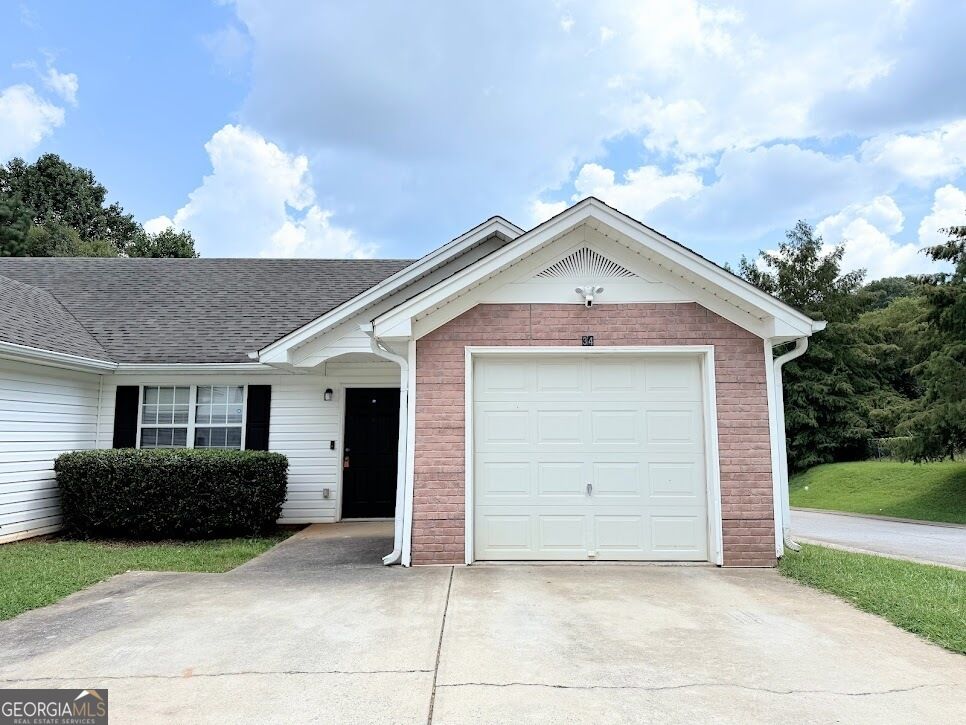 Property Photo:  209 E Wilson Street 34  GA 30180 