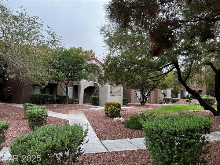 Property Photo: 7720 Secret Shore Drive 207 NV 89128