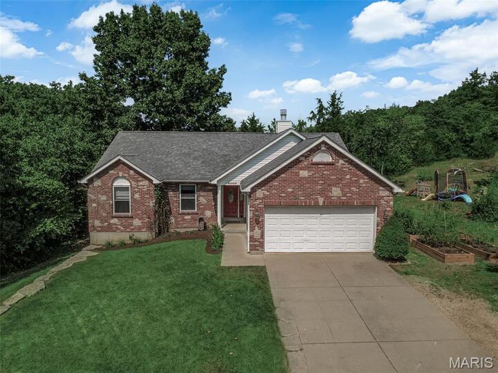 Property Photo:  6007 Peachtree Drive  MO 63050 
