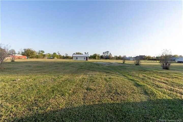 Property Photo:  1273 W Tank Farm Road W  LA 70605 