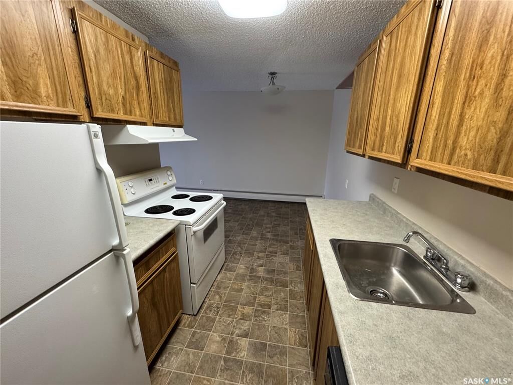 Property Photo:  1808 Eaglesham Avenue 306  SK S4H 3A8 