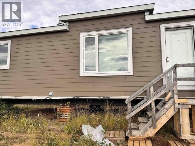 Property Photo:  3 Duplexes Req Relocation  NT  
