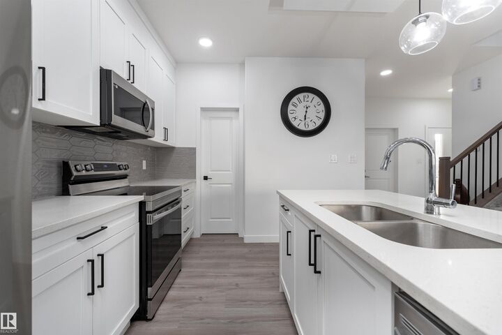 Property Photo: 1758 Erker Way NW AB T6M 0Z6