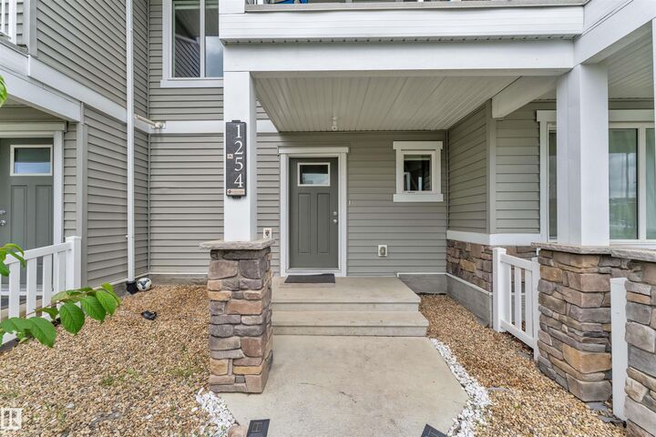 Property Photo: 1254 Aster Boulevard NW AB T6T 2N8