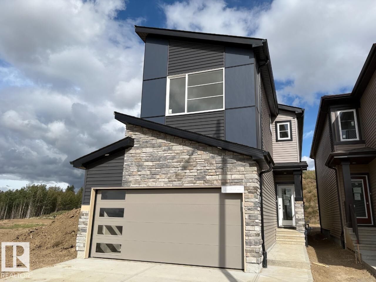 Property Photo: 4519 Warbler Loop NW AB T5S 0S7