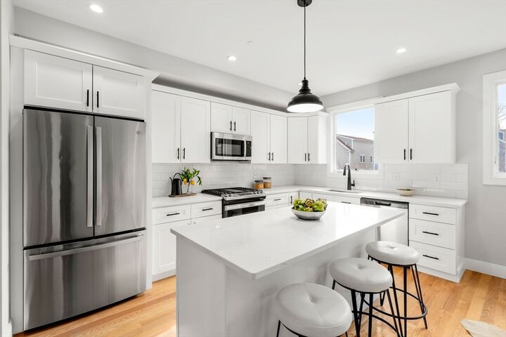 Property Photo:  123-125 Centre St Th6  MA 02124 