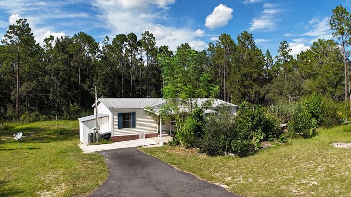 Property Photo:  18471 SW 44th Street  FL 34432 