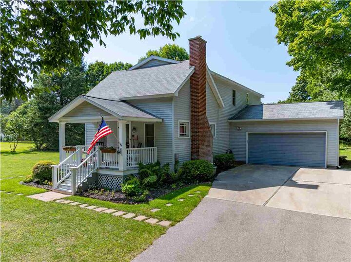 Property Photo:  8731 Mercer  MI 49720