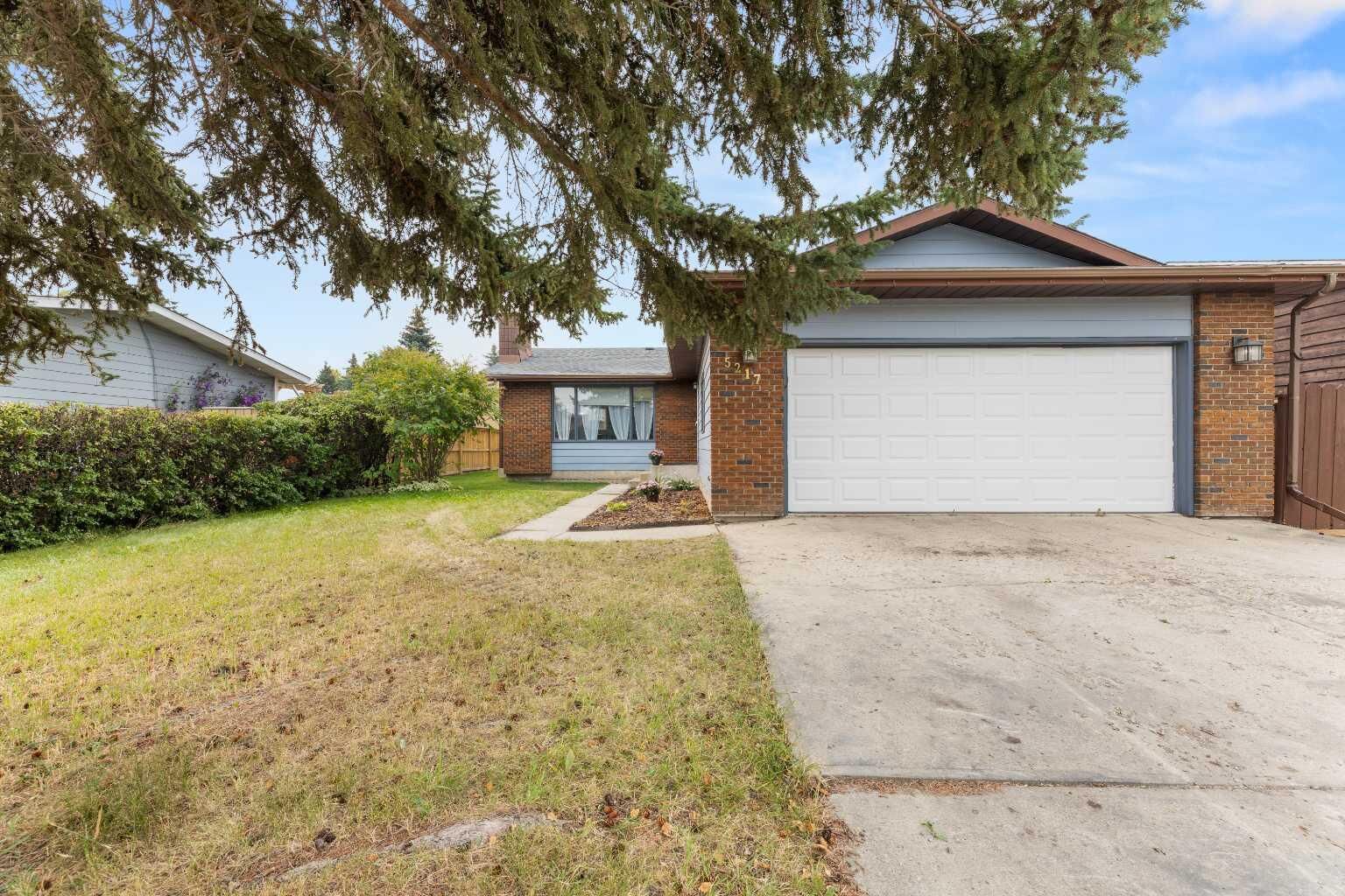 Property Photo: 5217 Shannon Drive AB T4H 1B2