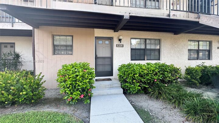 Property Photo:  5339 Treetops Drive T105  FL 34113 