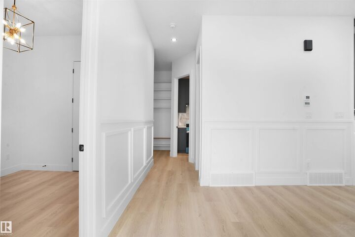 Property Photo: 1142 Gyrfalcon Crescent NW AB T5S 0S5