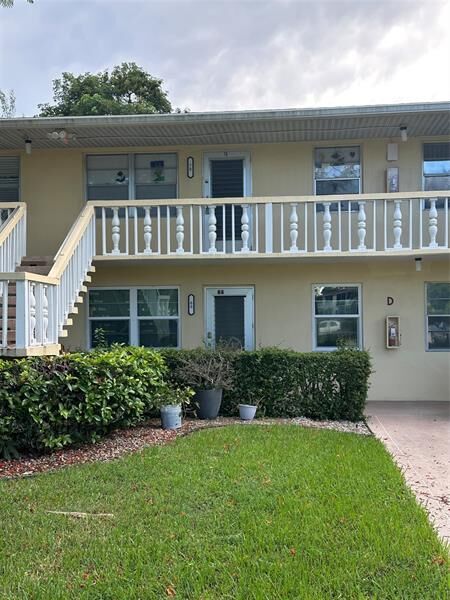 Property Photo:  66 Windsor D  FL 33417 
