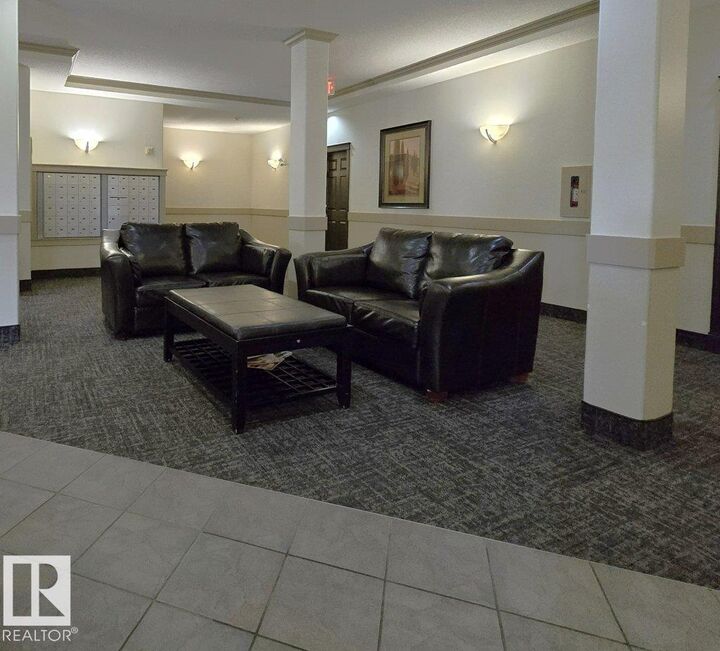 Property Photo: 8702 Southfort Drive 203 AB T8L 4R6