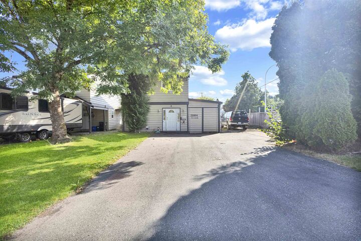 Property Photo:  20804 52A Avenue  BC V3A 6E5 