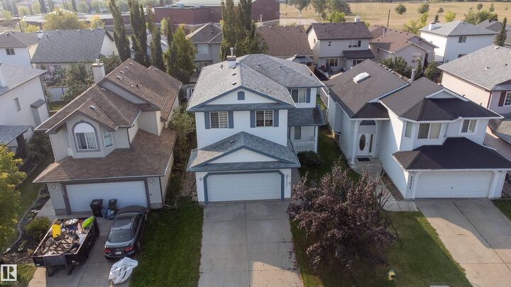 Property Photo:  2331 37B Avenue NW  AB T6T 1N9 