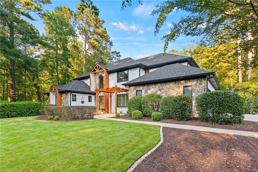 Property Photo:  8765 River Bluff Lane  GA 30076
