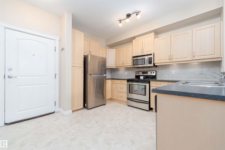 Property Photo:  12408 15 Avenue SW 419  AB T6W 1X2 