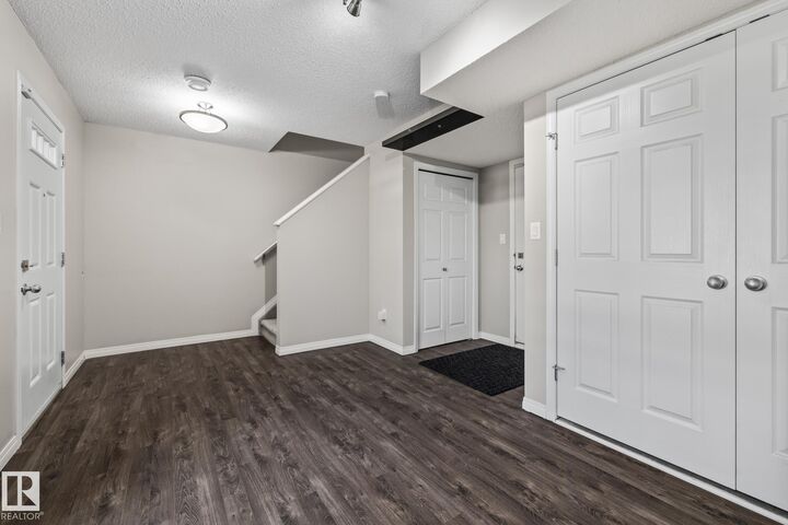 Property Photo: 7385 Edgemont Way NW 18 AB T6M 0R9